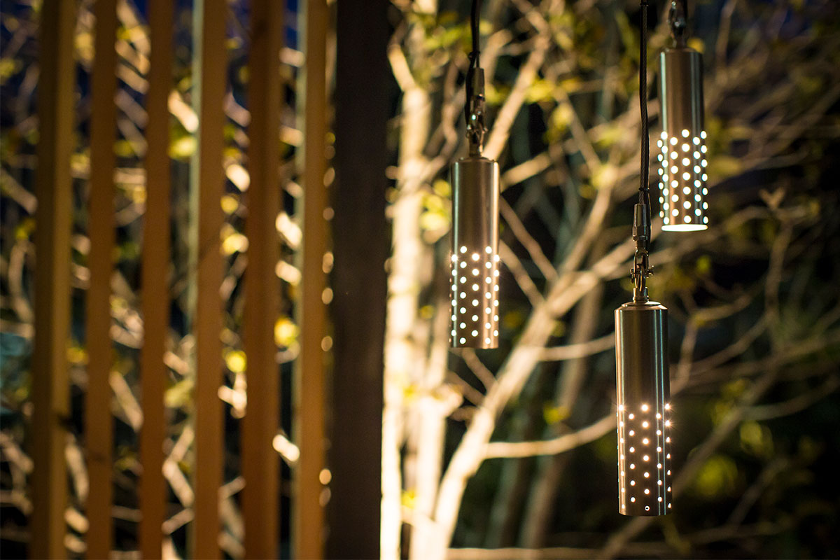 Hanging light speckle light by Gardens at Night suspended from trees at melbourne flower garden show