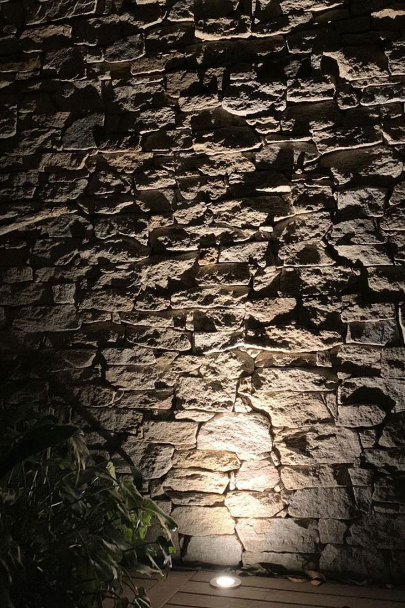 Gardens at Night inground light uplighting Alphine dry stone wall