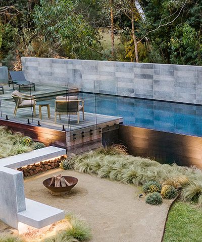 Gardens at Night lighting in landscaped garden with Laguna Pool