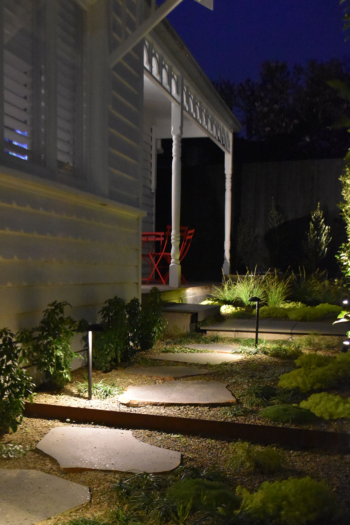 Gardens at Night Path Light Dome in landscaped garden illuminating stepping stones on path