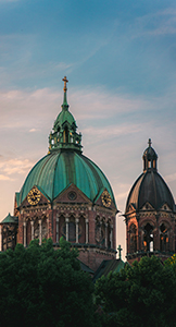 Green dome of a building showing patina 